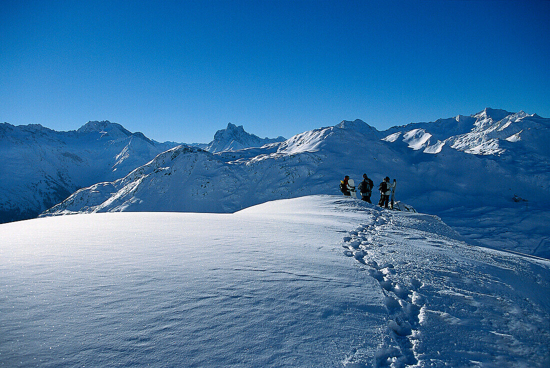 Drei Snowboarder, Valluga, Arlberg, Österreich