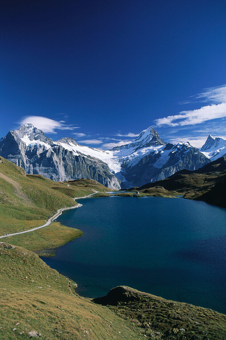 Alpine lake Bachalpsee with Wetterhorn and Schreckhorn, near Grindelwald, Bernese Oberland, Berne, Switzerland