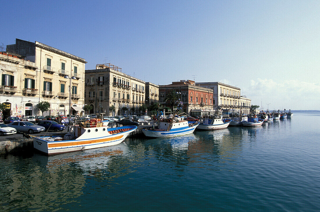 Boats and city, Syracus, Ortigia, Sicily, Italy