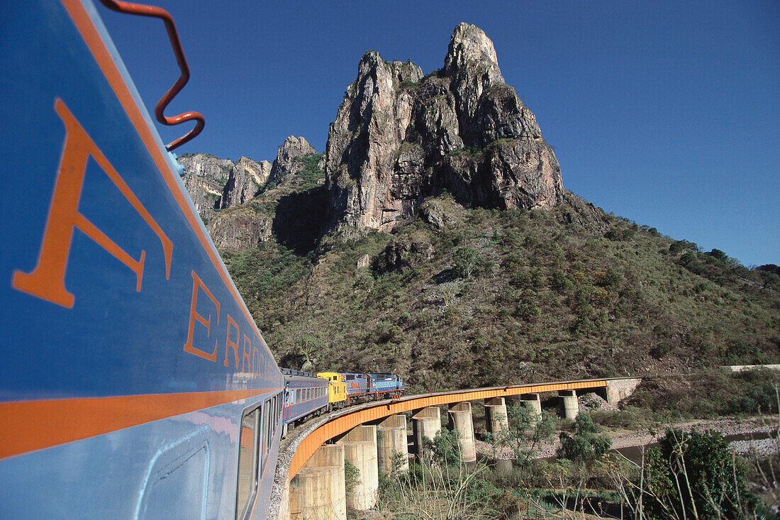 Train 'El Pacifico' under blue sky, Mexico, America