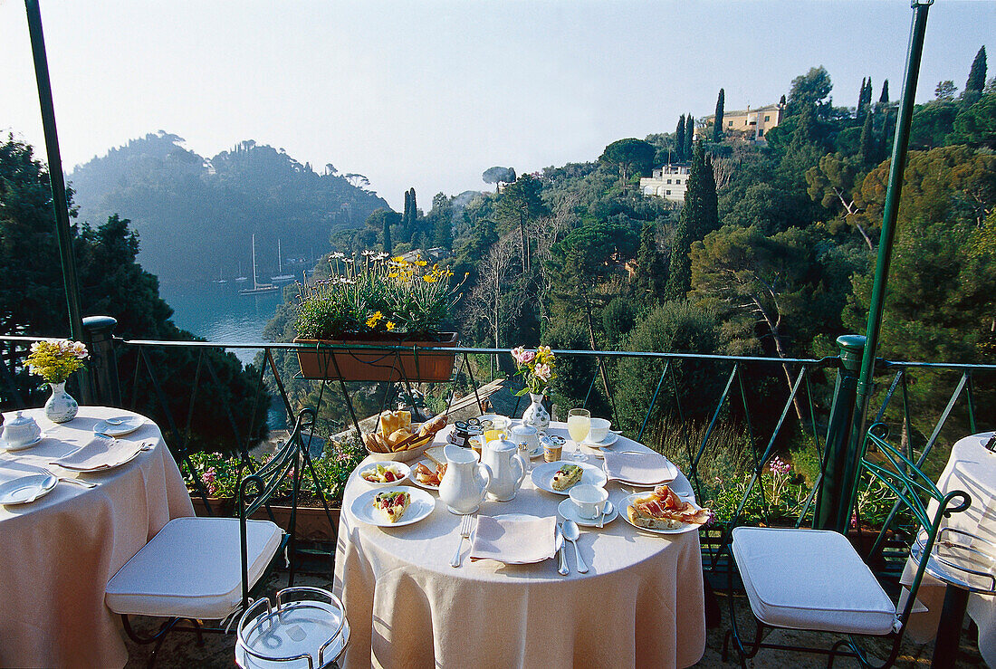 Tables are laid at the terrace of Hotel Splendido, Portofino, Liguria, Italy, Europe