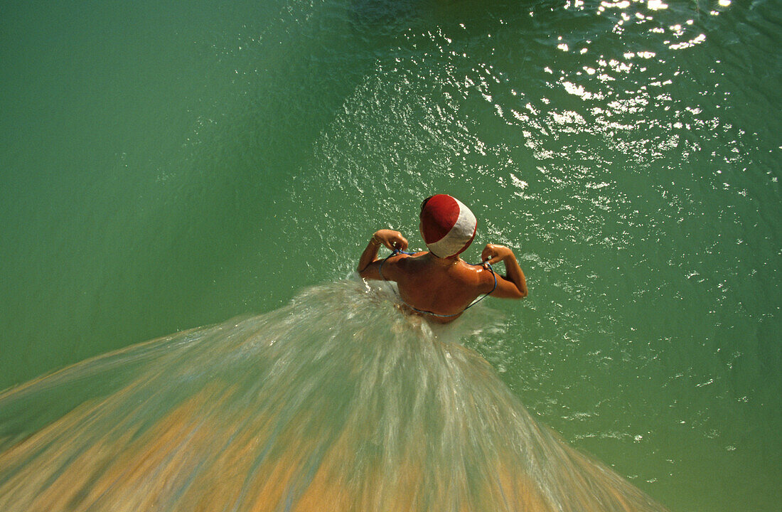 woman in thermal pool, Bagno Vignoni, Tuscany, Italy