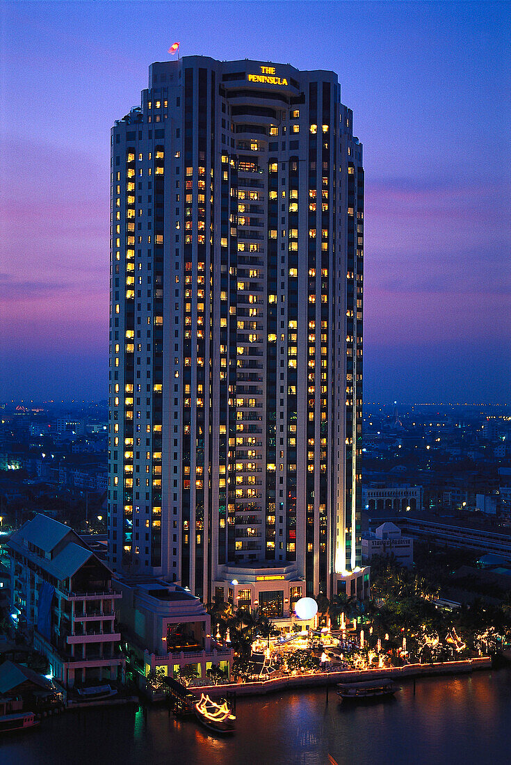 Hotel Peninsula at a river in the evening, Bangkok, Thailand, Asia