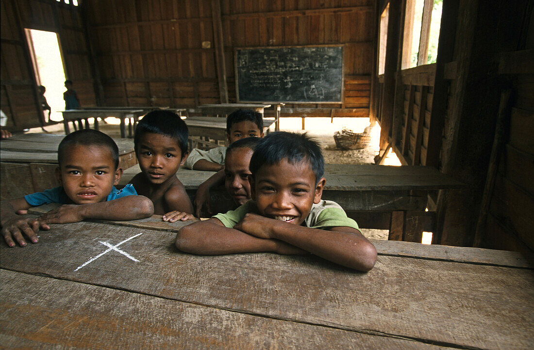 young boys in village school in Boloven Plateau, Laos