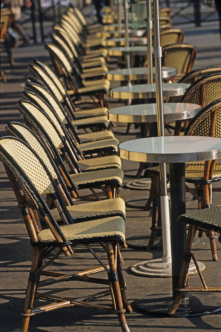 Chairs and tables of the street cafe, Paris, France