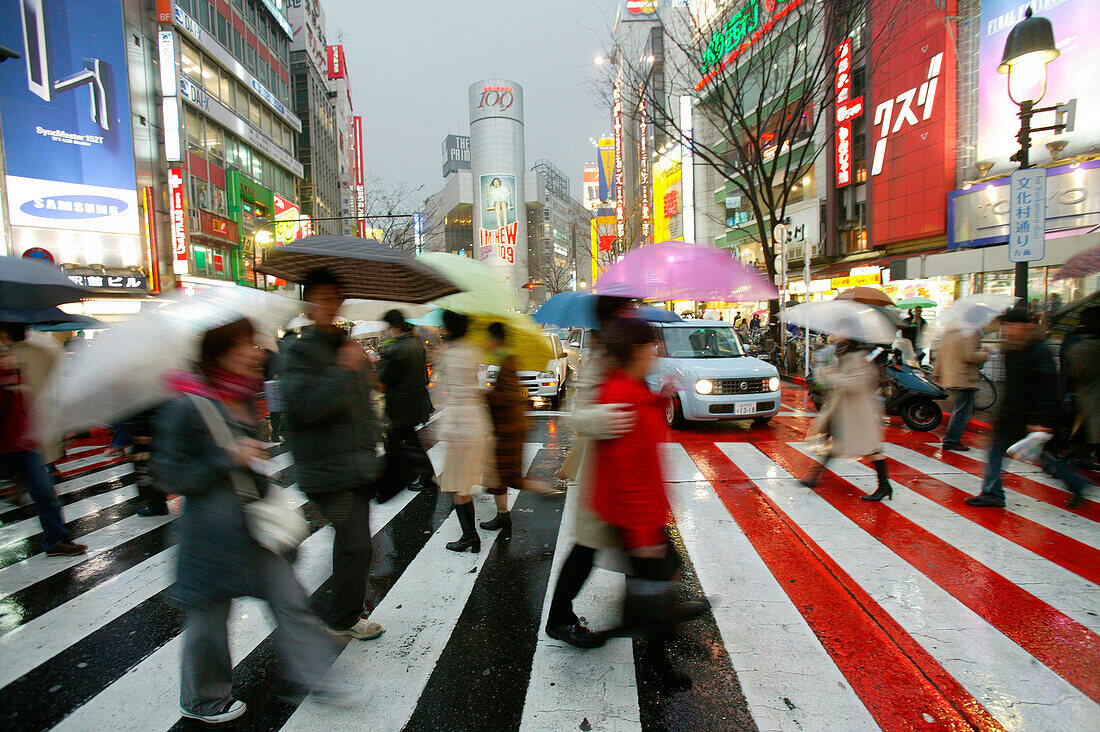 Pedestrians crossing, Shibuya Station Square, red pedestrian crossing Tokyo, Japan