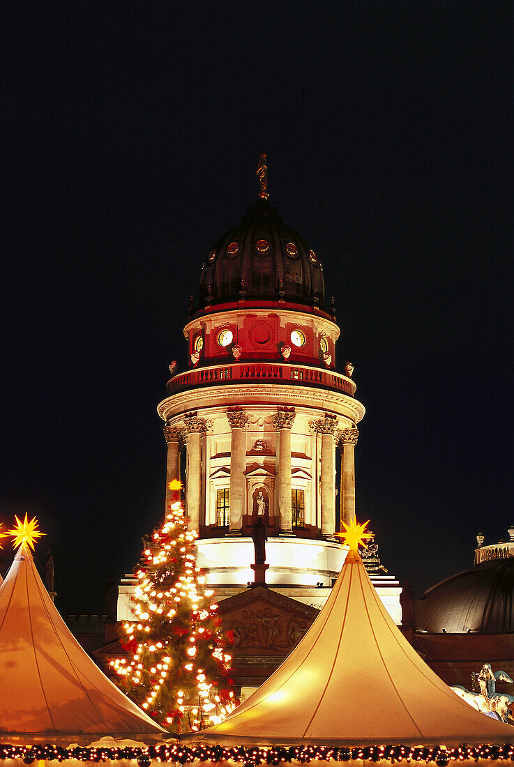 Christmas Market in front of German Cathedral at night, Gendarmenmarkt, Berlin, Germany