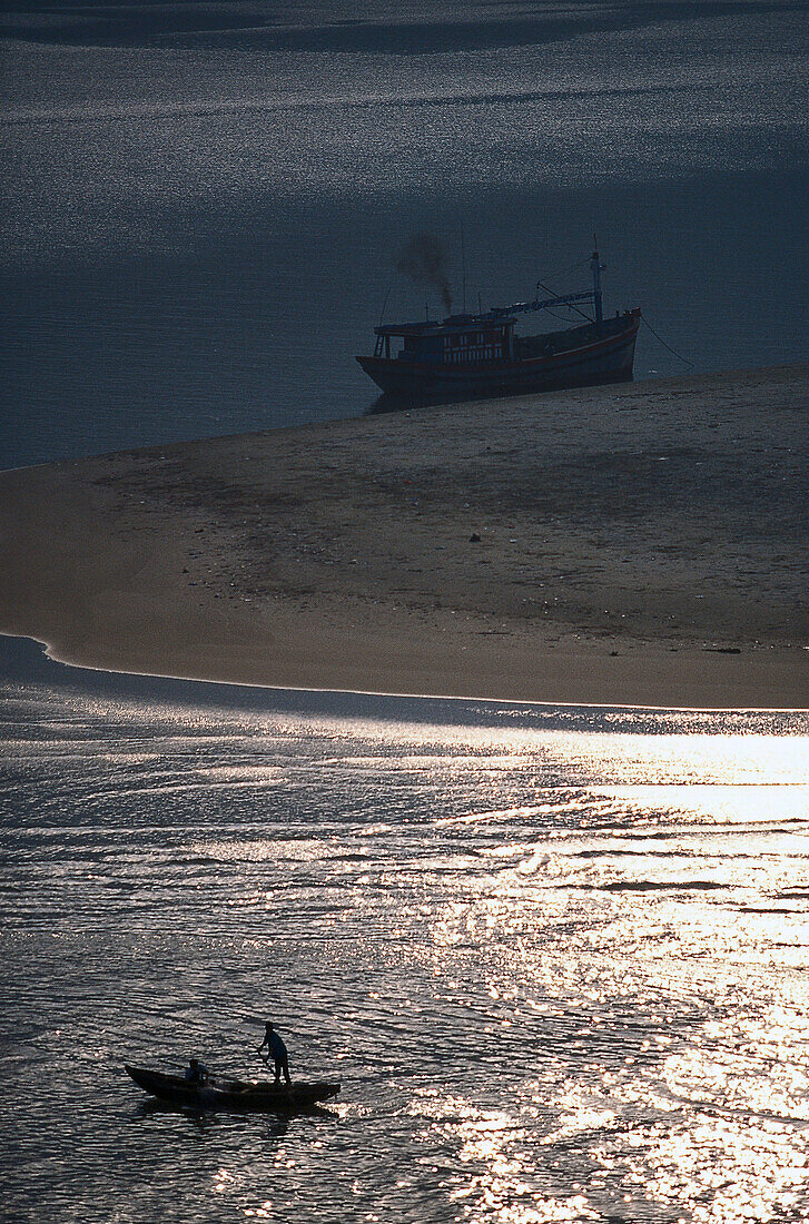 Man on a boat on a river near Hue, Vietnam