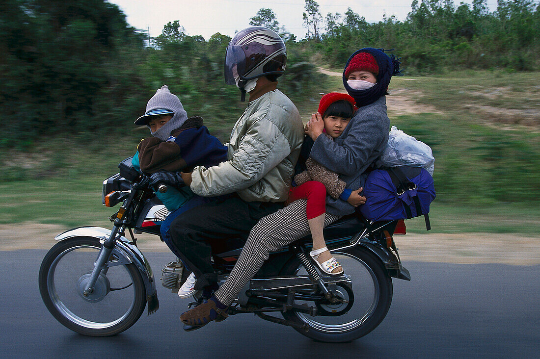 Family on a motorbike, North Vietnam Vietnam