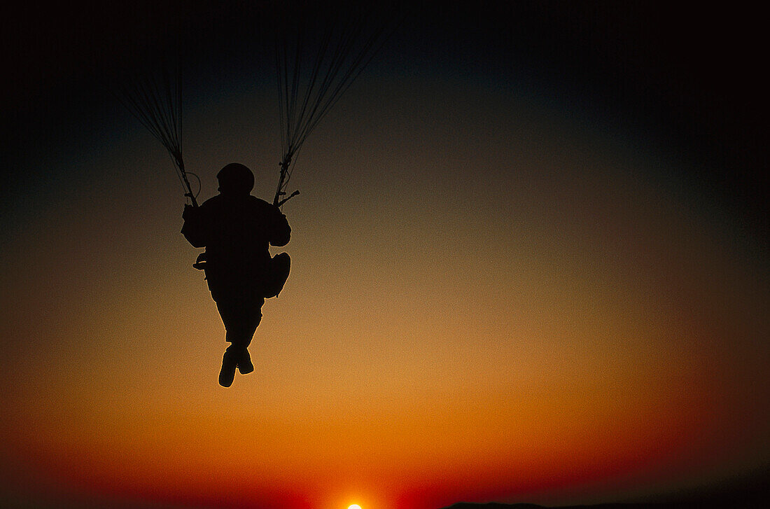 Paraglider at sunset, Australia