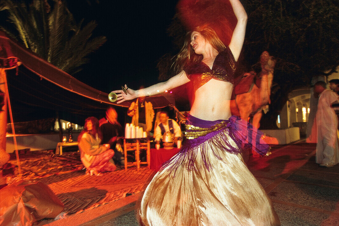 Young Belly Dancer dancing in Club Jerba La Douce, Djerba, Tunesia