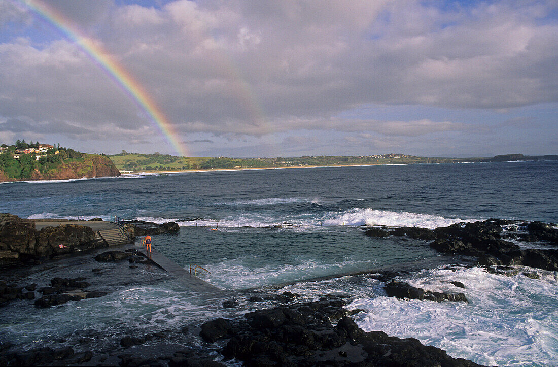 Rainbow over the rocky coast, Kiama, New South Wales, Australia