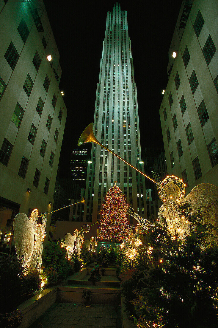 Christmas decoration in front of Rockefeller Center at night, Manhattan, New York City USA, America