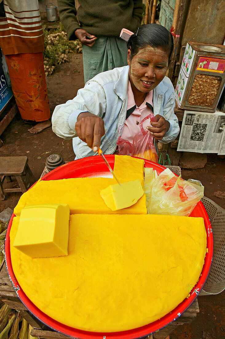 fresh yellow tofu for sale, Market Bago, Myanmar