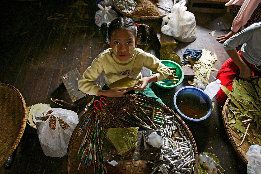 very young girl in cigar factory, Bago, Myanmar