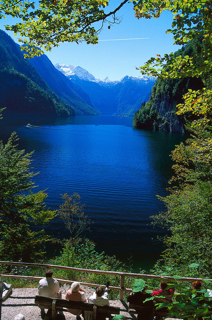 Koenigssee, People resting in front of Koenigssee in Natural Park Berchtesgaden, Bavaria, Germany