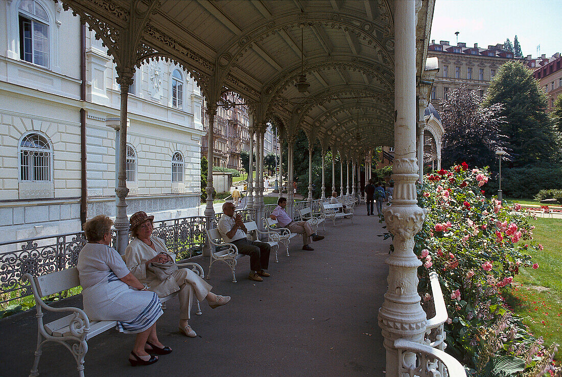 People relaxing in Spa Park, Karlovy Vary, Bohemia, Czech republic