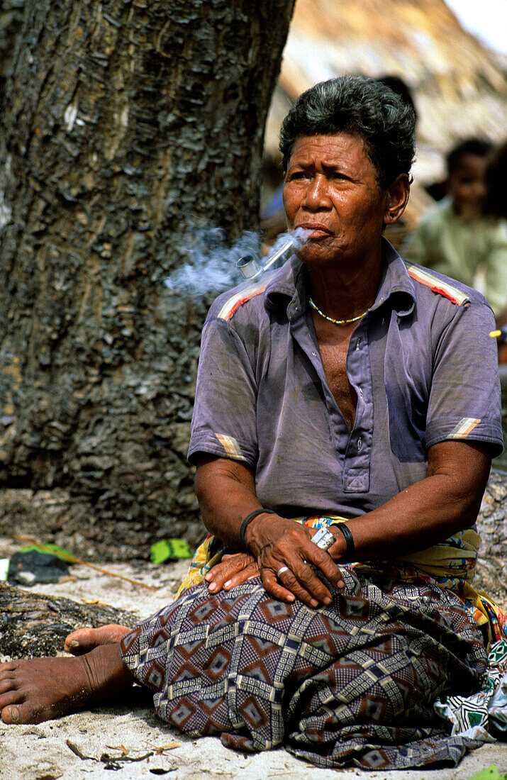 Woman, Smoke, Tikopia, Temotu Province Solomon Islands, South Pacific