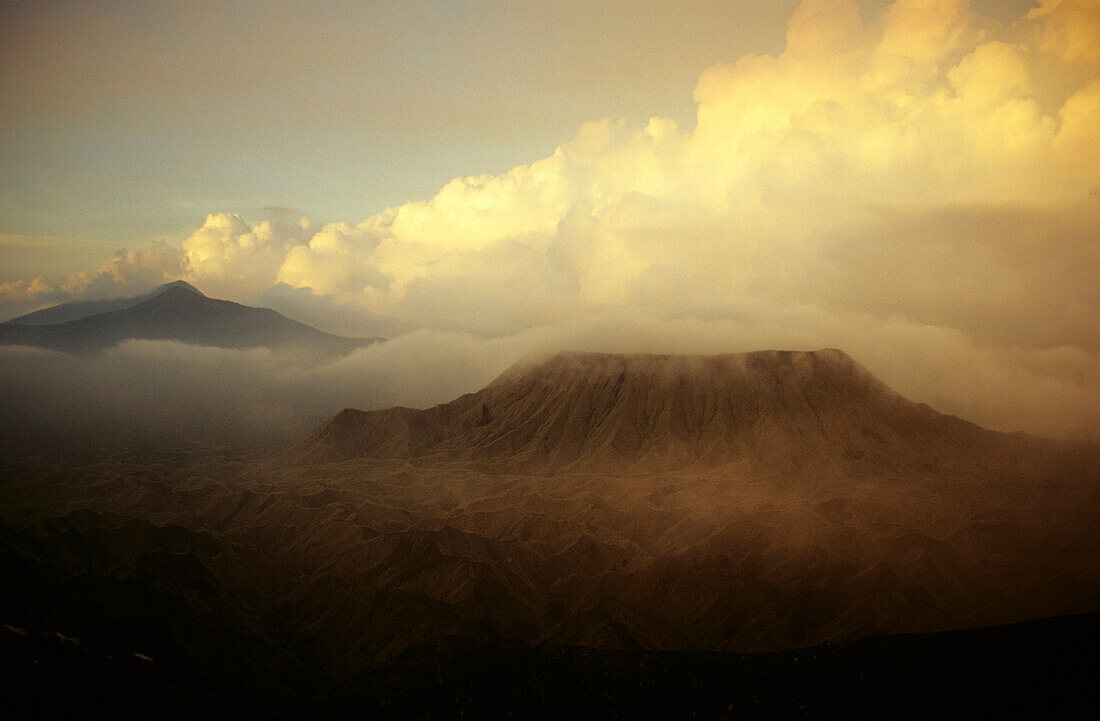 Smoking volcano crater under thick clouds, Ambrym, Caldera, Vanuatu, South Pacific