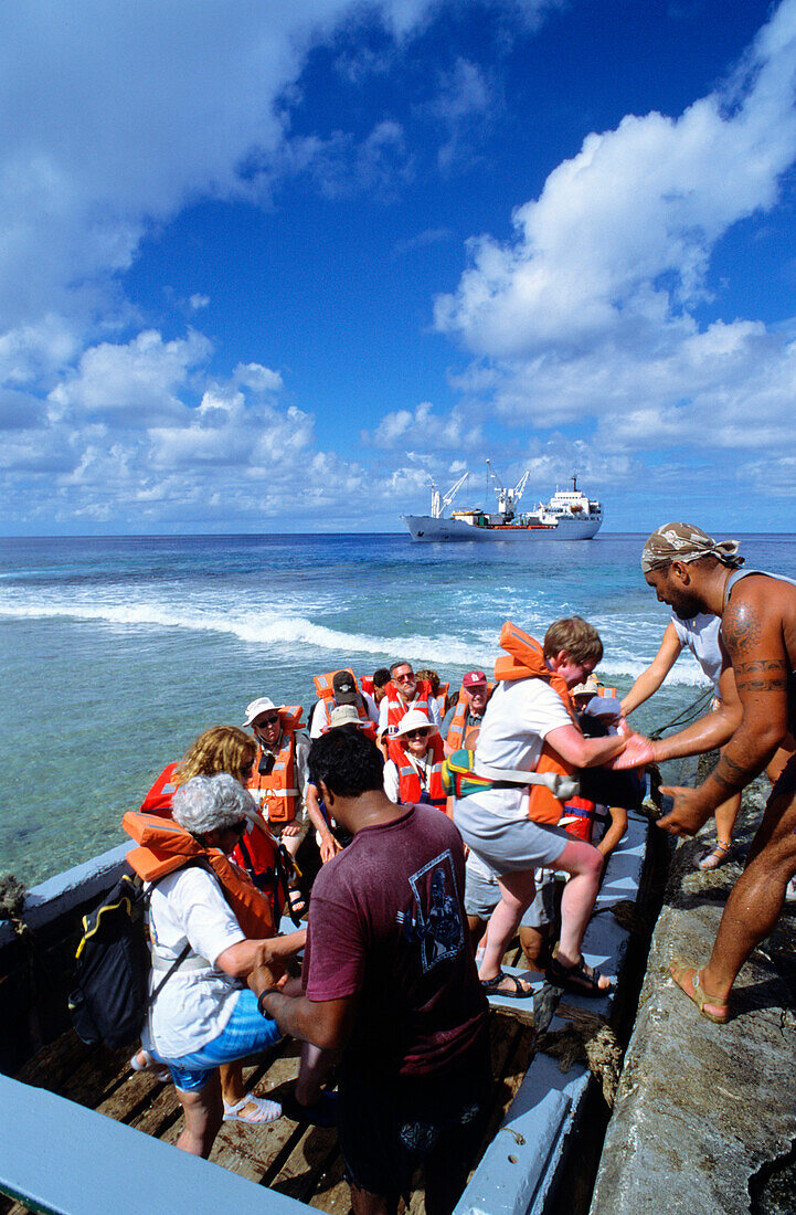 Tourist, Landing, Takapotu, Tuamotu Islands French Polynesia, South Pacific