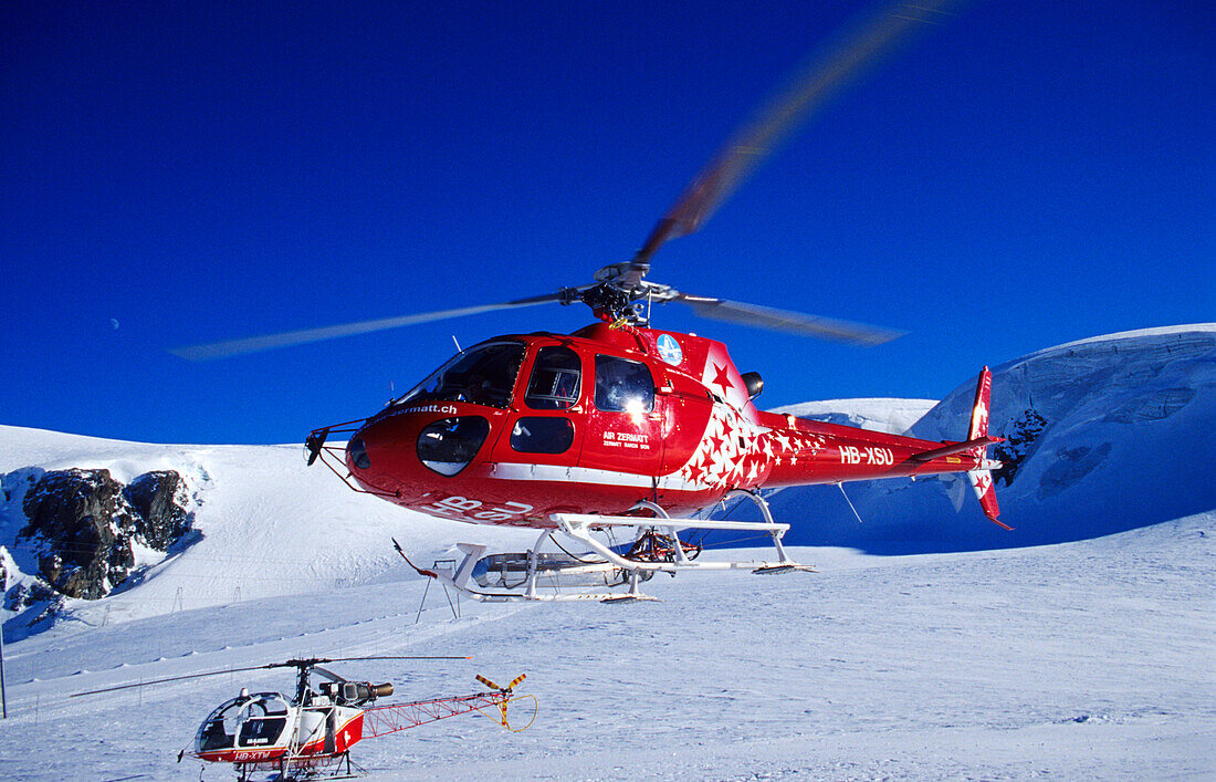 Rescue helicopter , rescue helicopter , Rescue helicopter , Mountain rescue, Zermatt, Alps, Switzerland , Mountain rescue, Zermatt- Alps, Switzerland