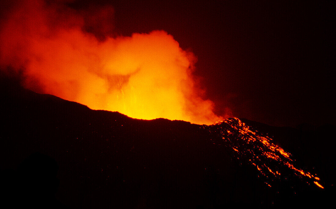 Volcano eruption, Magma and lave flowing down the mountain, Nyiramuragira volcano, Goma, Congo, Africa