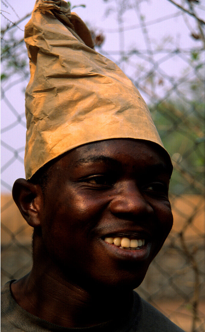 Funny Portrait, African worker wearing a hat, smiling, Goma, Congo, Africa