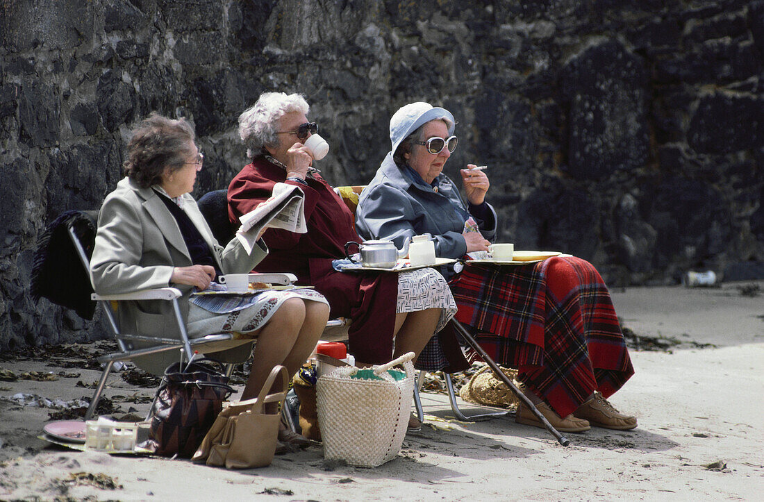 Older women at beach, Port Patrick, Scotland