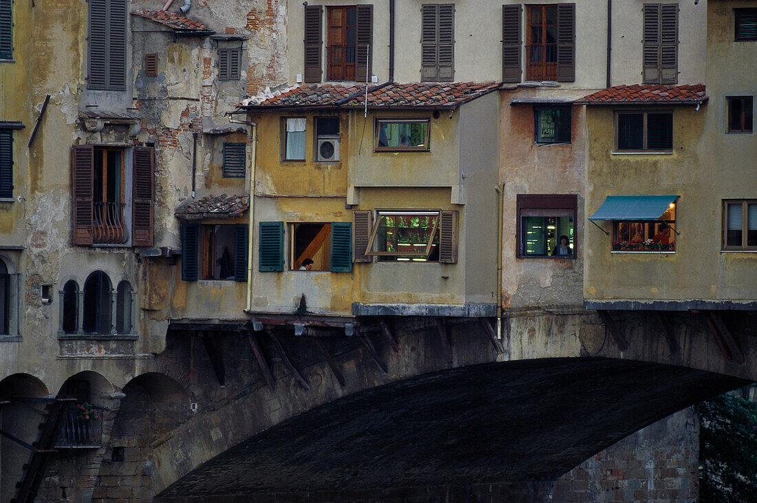 View at the houses on the bridge Ponte Vecchio, Florence, Tuscany, Italy