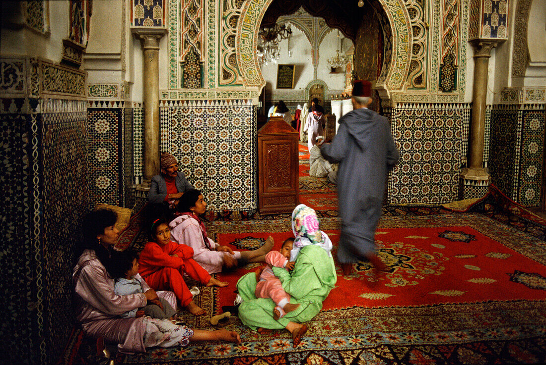 Women outside a mosque, Marrakech, Morocco North Africa