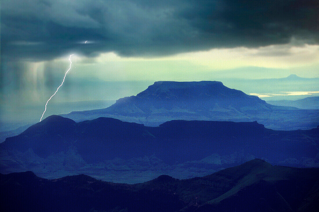 Thunder clouds, lightning and rain over Drakensberge, Kwazulu Natal, South Africa, Africa