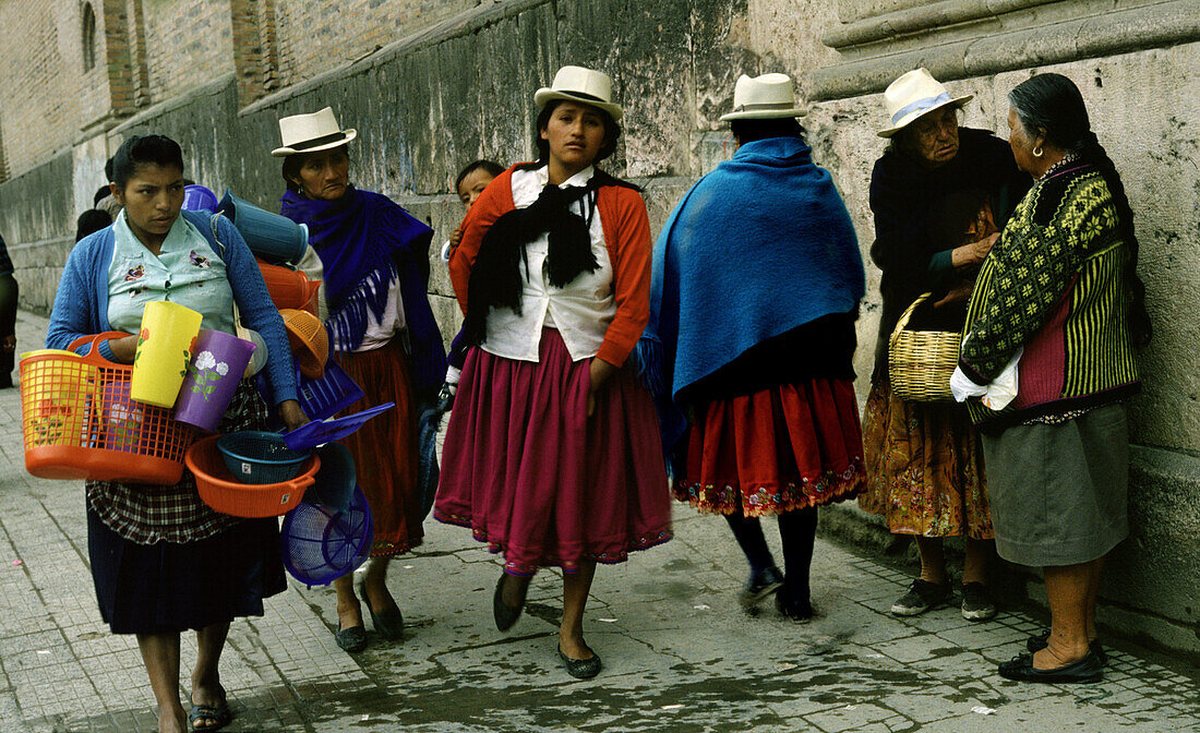 Indio women near Cuenca Cathedral, Cuenca, Ecuador South America