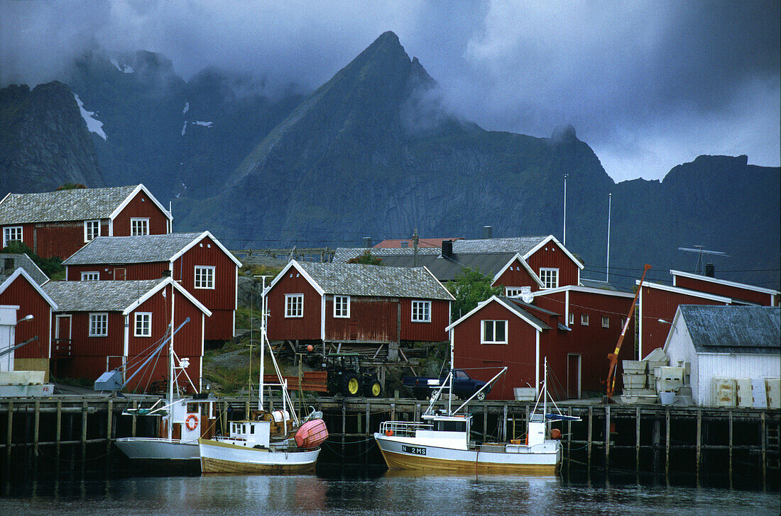 Fishing boats and rorbu huts in Reine fishing vill, Reine, Lofoten Islands Norway, Scandinavia