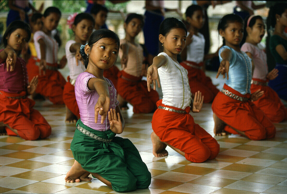 Girls learning temple dance at the Royal Academy of Performing, Phnom Penh, Cambodia, Asia