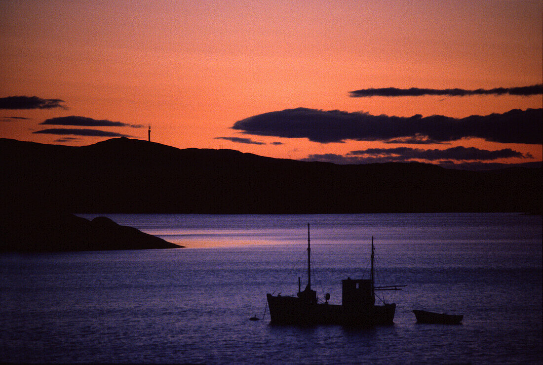 Fishing boat at sunset, Lofoten Islands, Norway Scandinavia