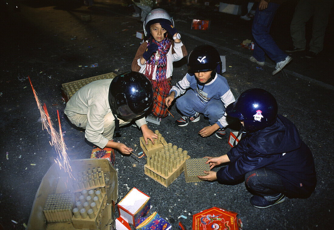 Yenshui fireworks festival, kids lighting firework, Yenshui, Tainan County Taiwan, Asia