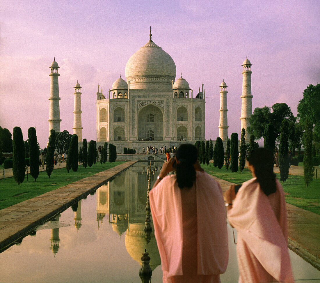 Indian tourists photographing the Taj Mahal in the evening, Agra, Uttar Pradesh, India, Asia