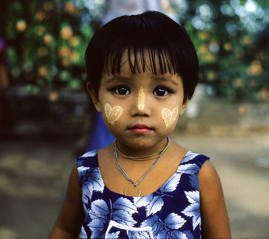 Girl with Thanaka make up, , Rangoon, Myanmar Asia