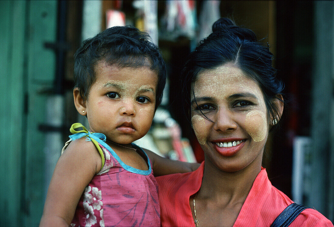 Mother and girl with Thanaka paste, Rangoon, Myanmar, Asia