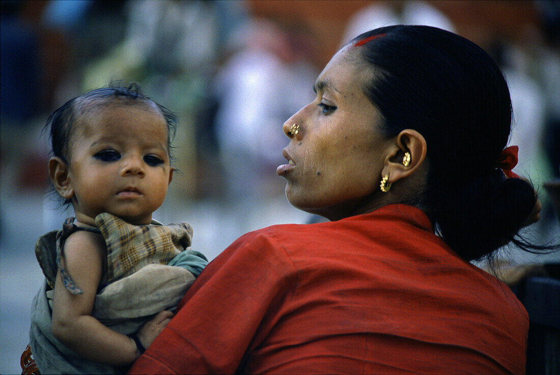 Mother and baby in Kathmandu, Kathmandu, Nepal Asia