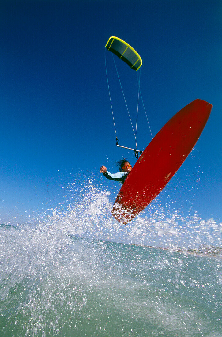 Man kiteboarding, jump License image 70042136 lookphotos