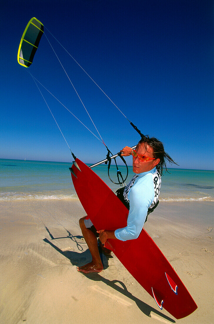 Man preparing for kiteboarding