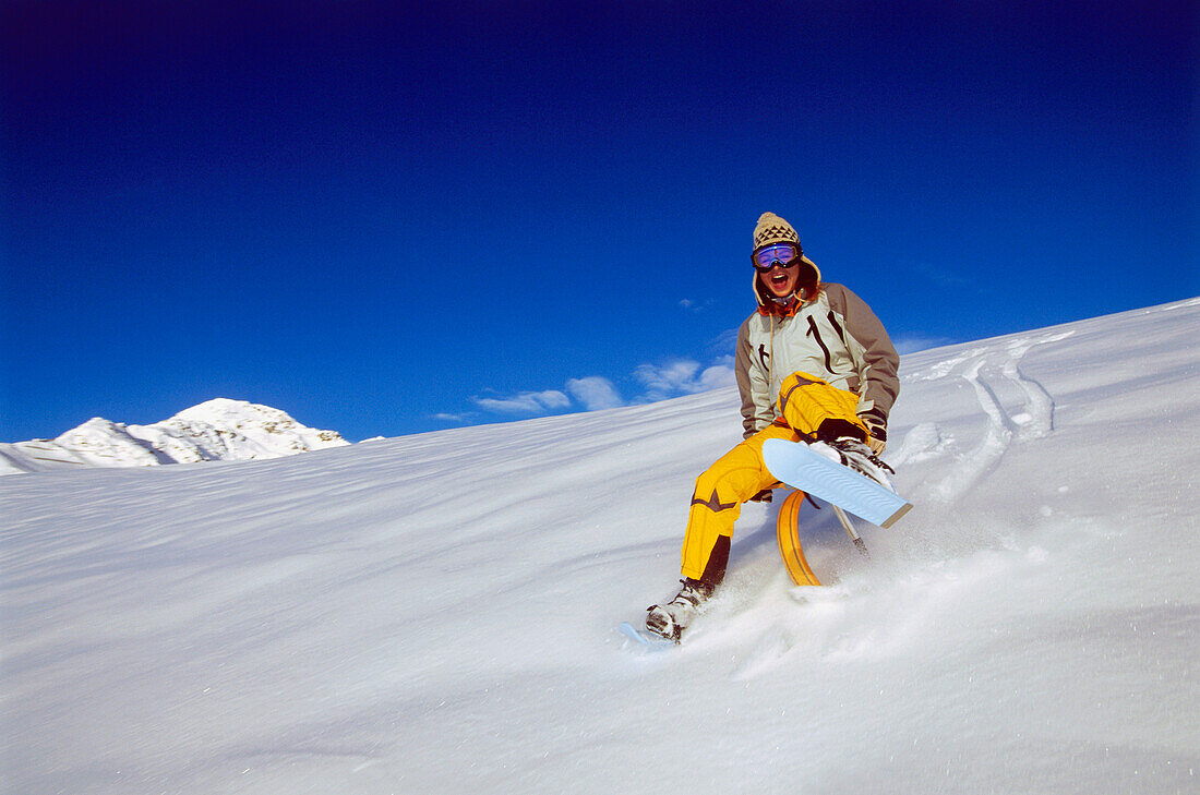 Young woman on skifox downhill, Serfaus, Tyrol, Austria