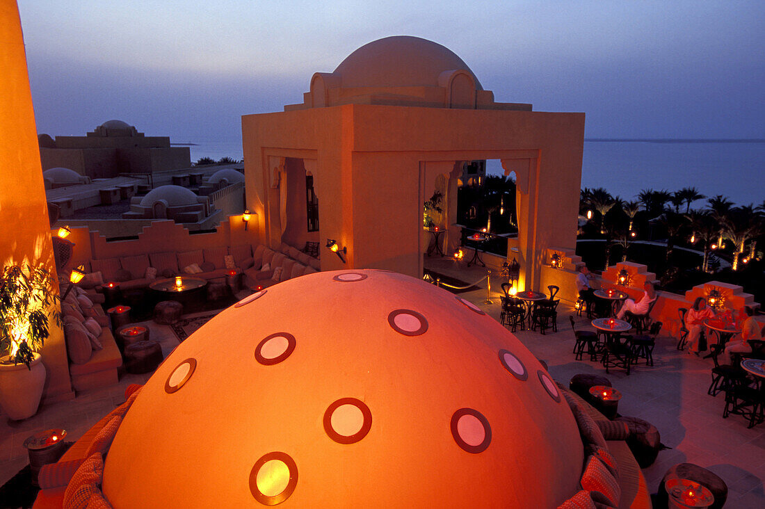 Bar on the roof deck of the Royal Mirage Hotel in the evening, Dubai, United Arab Emirates