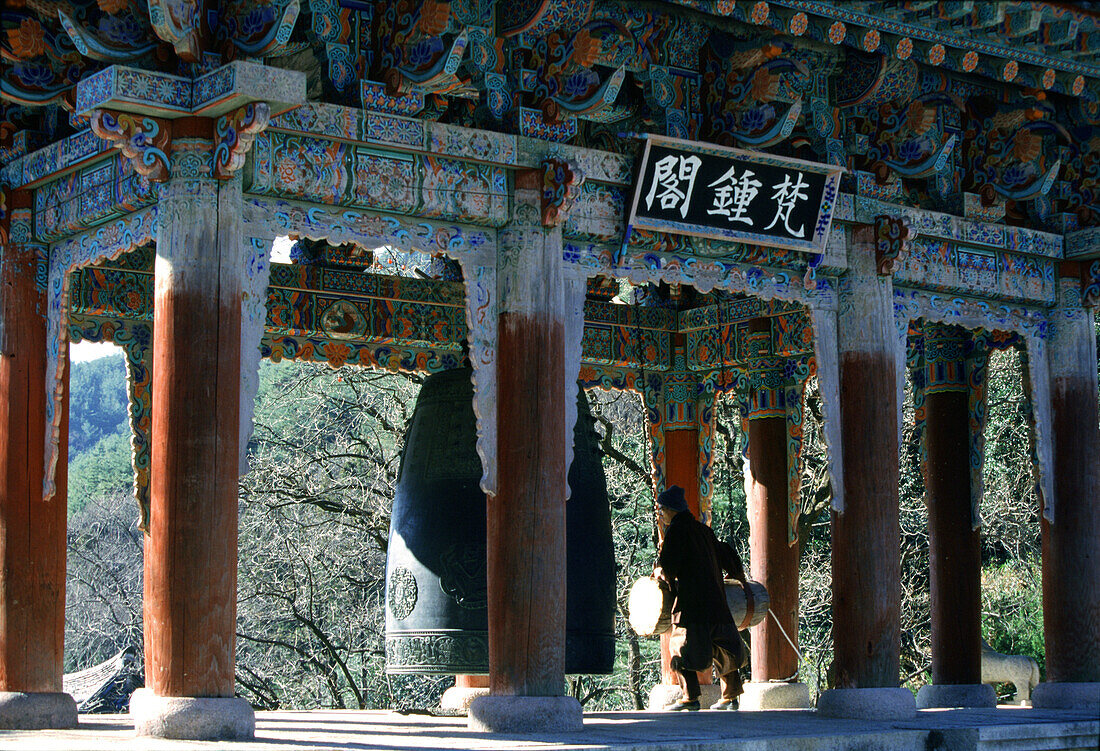Monk ringing bell, Hwaom-sa monastery, Hwaom-sa, South Korea Asia