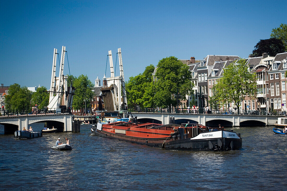 Barge, Magere Brug, Amstel, Barge passing open Magere Brug Skinny Bridge, , Amsterdam, Holland, Netherlands