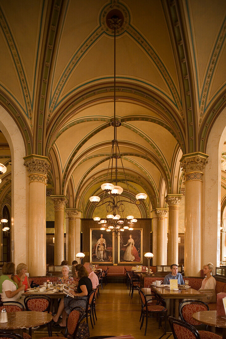 People sitting inside at Cafe Central, Vienna, Austria