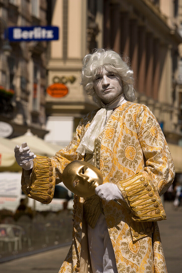 Sreet artist wearing fancy-dress costume like Mozart, Vienna, Austria