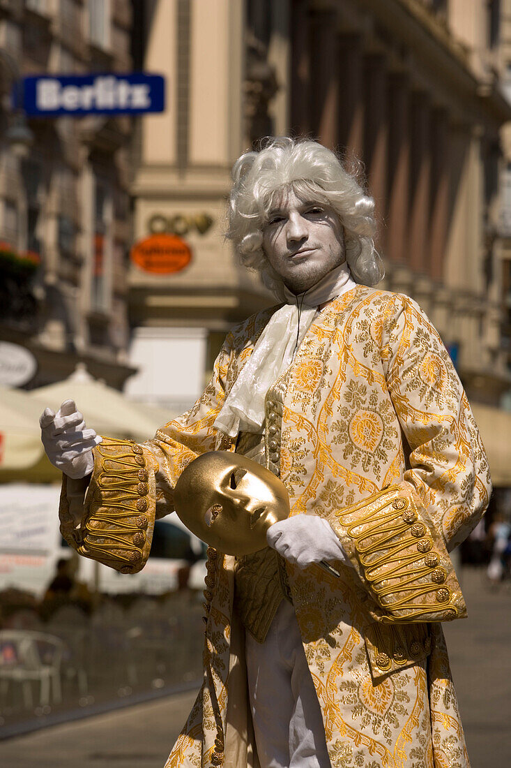 Street artist wearing fancy-dress costume like Mozart, Vienna, Austria