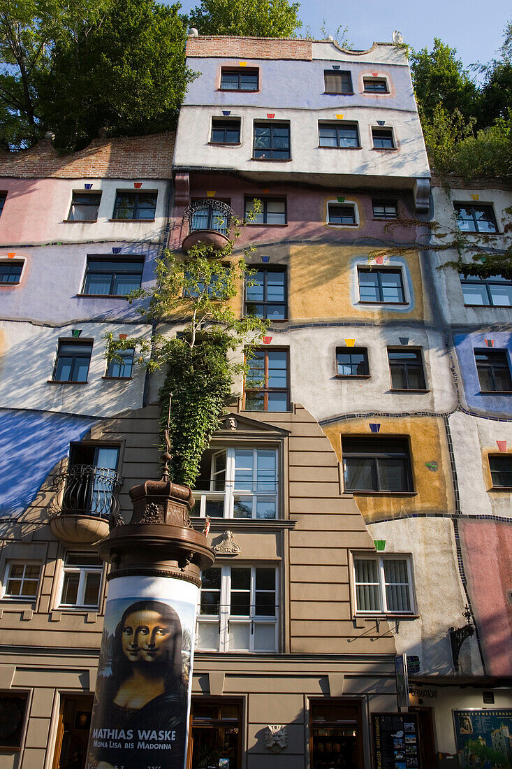 Advertising column in front of the Hundertwasserhaus, Vienna, Austria